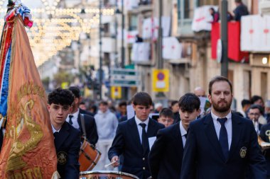 04-19-2024: Close-up of a music band parading at the pasodoble festival prior to singing the festival anthem of Alcoy, Spain clipart
