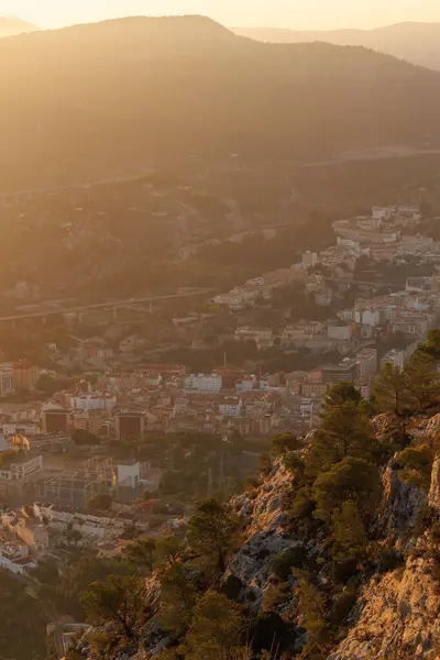 stock image Cityscape of Alcoy city at sunrise from Alt de les Pedreres, Spain