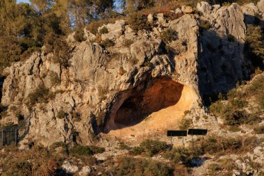 Landscape of the cave enclave of the post-Paleolithic rock art site La Sarga, Alcoy, Spain clipart