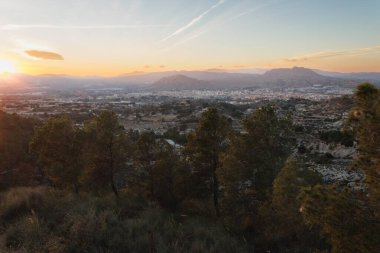 Landscape of Petrer from the Sierra del Cid during sunset, Spain clipart