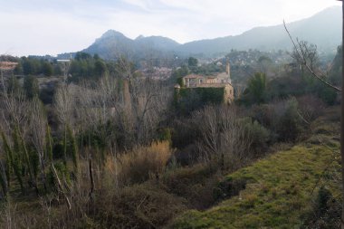 Landscape of the source of the Molinar River in Alcoy with ruins of old factories, Spain clipart