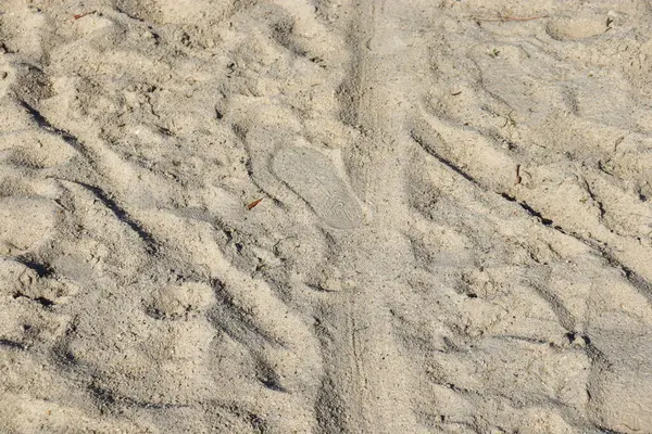 Ayakkabı izli kum dokusu arkaplanı
