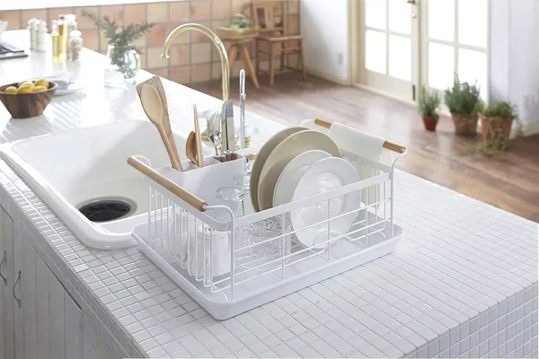 Clean dish in the rack in kitchen interior