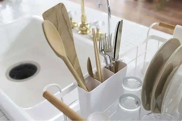 Clean dish in the rack in kitchen interior