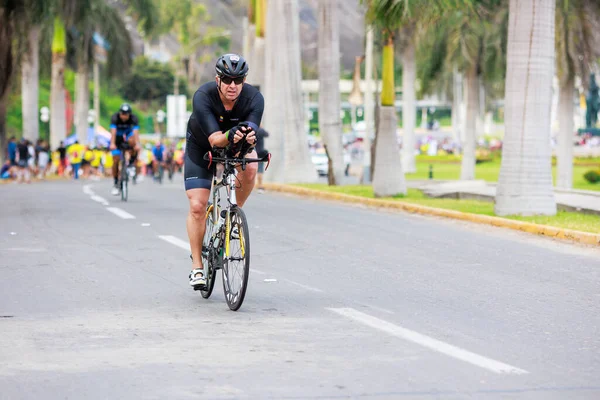 Stock image IRONMAN 70.3 LIMA, Athlete competing PERU - APRIL 23, 2023 