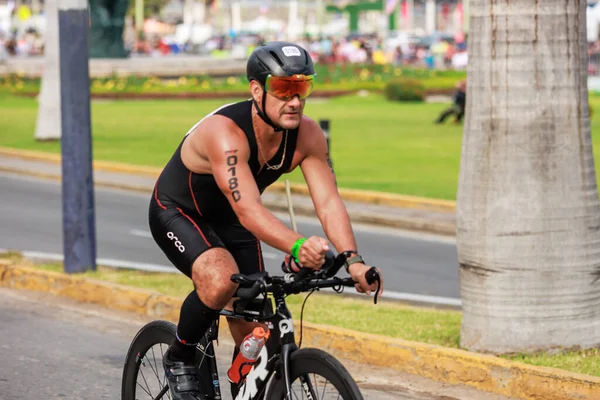 Stock image IRONMAN 70.3 LIMA, Athlete competing, PERU - APRIL 23, 2023 