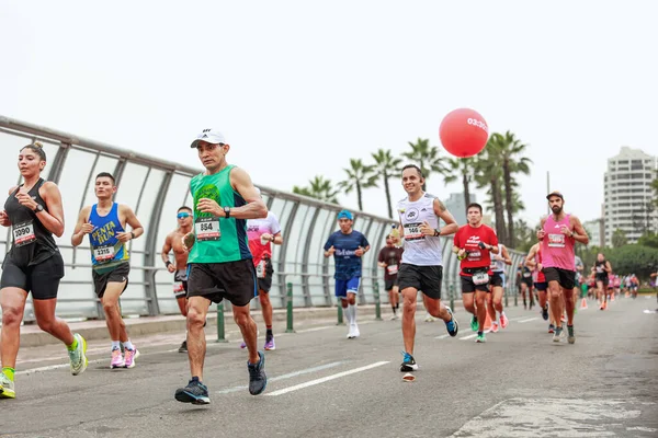 Lima 42k Maratonu. 21 Mayıs 2023 'te yarışan sporcu