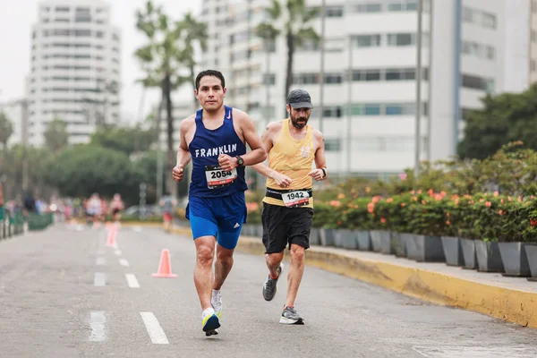 stock image Lima, Peru - May 21, 2023: Athletes compete in the Lima Marathon 42K 2023