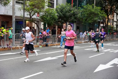 Lima, Peru - May 21, 2023: Athletes compete in the Lima Marathon 42K 2023 clipart