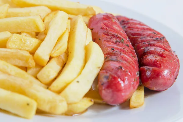 stock image sausages, french fries and sausages