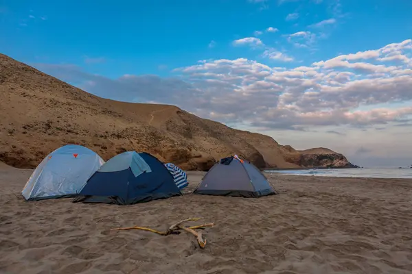 Vista marina del puerto de Supe, el muelle y los botes frante al mar, Provincia de Barranca, Lima, Peru.