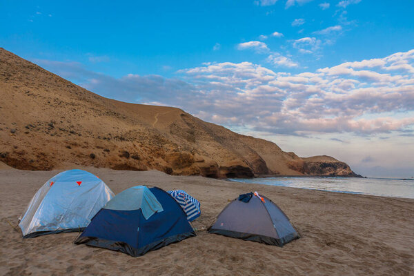 Sea view of the port of Supe, the dock and the boats in front of the sea, Province of Barranca, Lima, Peru.