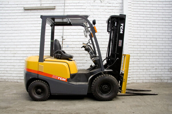 yellow tractor with a black background