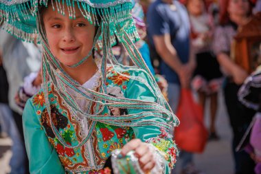 Feast of the Virgen del Carmen in Paucartambo, Cusco. Dancers and the public celebrate at the feast of the Virgen del Carmen. clipart