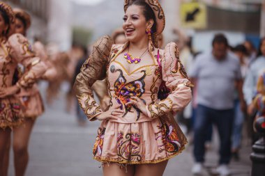 Dancers in the traditional parade for the Festivity of the Virgin of Candelaria in the historical center of Lima, Peru. November 18, 2023.  clipart