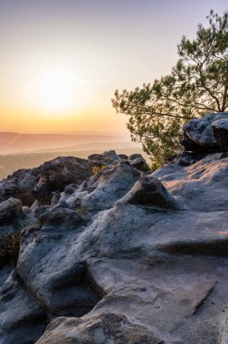 Autumn sunset on Mount Gohrisch, Saxon Switzerland, Germany clipart