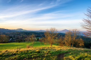 View from the Kov vrch hill in Rynartice on the landscape of the Bohemian Switzerland National Park. Czech Republic, Europe. clipart