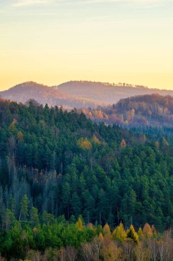 Cross peak - Krizovy vrch, beautiful autumn views of the region during sunrise. Rynartice, Jetrichovice region, Czech Switzerland, Czech republic clipart