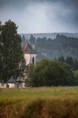 Old churchSaint John of Nepomuk in Vrchni Orlice, Bartosovice, Orlicke mountains, Czech Republic clipart