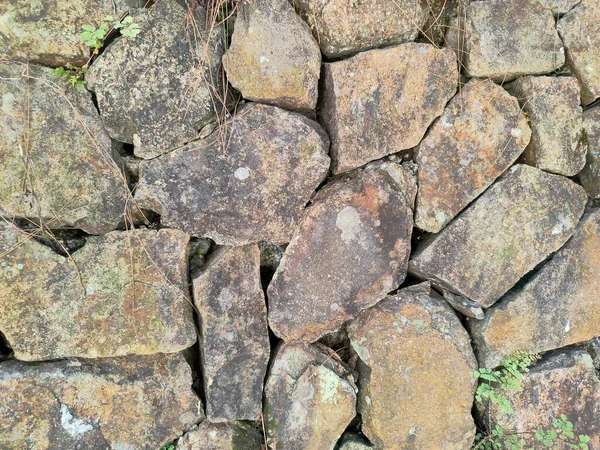 バルトの壁は大きな山の岩をテクスチャしました マウンテンストーン壁の背景 — ストック写真
