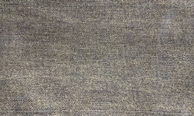 Kot pantolon arkaplan dokusu. Kumaş dokusuna yakın çekim. Desen, arkaplan. 