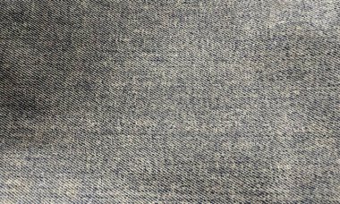 Kot pantolon arkaplan dokusu. Kumaş dokusuna yakın çekim. Desen, arkaplan. 