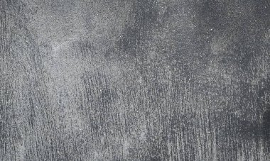 Parlak boya ve yıpranmış parçalarla eski beton duvar yüzeyinin soyut arkaplanı. Güzel Soyut Grunge Dekoratif Karanlık Stucco Duvarı Arkaplanı. Sanat pürüzlü Stylize Doku. Aşınmış bej renkli, çizik parmaklarla kaplanmış yıpranmış beton duvar.