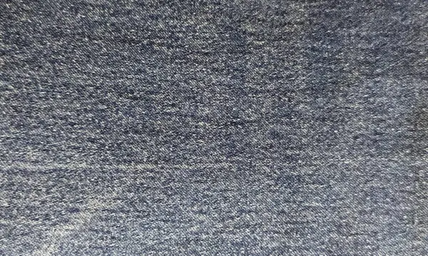 Kot pantolon arkaplan dokusu. Kumaş dokusuna yakın çekim. Desen, arkaplan. 