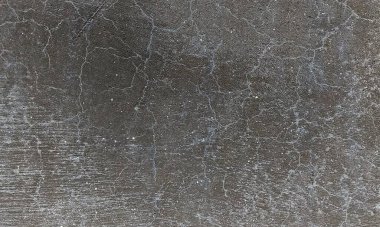 Parlak boya ve yıpranmış parçalarla eski beton duvar yüzeyinin soyut arkaplanı. Güzel Soyut Grunge Dekoratif Karanlık Stucco Duvarı Arkaplanı. Sanat pürüzlü Stylize Doku. Aşınmış bej renkli, çizik parmaklarla kaplanmış yıpranmış beton duvar.