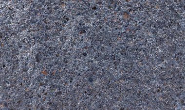 Parlak boya ve yıpranmış parçalarla eski beton duvar yüzeyinin soyut arkaplanı. Güzel Soyut Grunge Dekoratif Karanlık Stucco Duvarı Arkaplanı. Sanat pürüzlü Stylize Doku. Aşınmış bej renkli, çizik parmaklarla kaplanmış yıpranmış beton duvar.