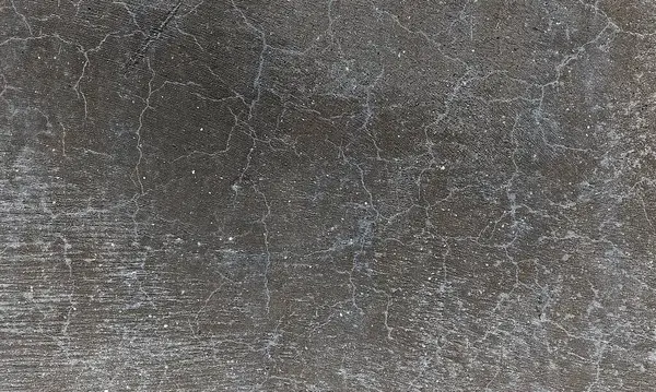 Parlak boya ve yıpranmış parçalarla eski beton duvar yüzeyinin soyut arkaplanı. Güzel Soyut Grunge Dekoratif Karanlık Stucco Duvarı Arkaplanı. Sanat pürüzlü Stylize Doku. Aşınmış bej renkli, çizik parmaklarla kaplanmış yıpranmış beton duvar.