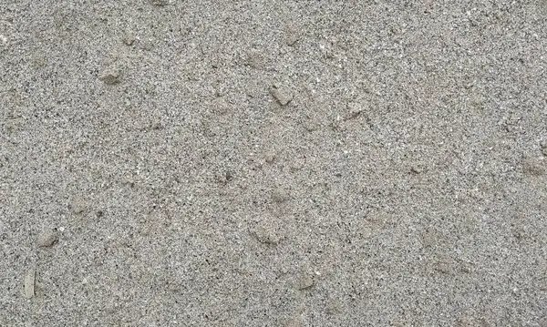 Parlak boya ve yıpranmış parçalarla eski beton duvar yüzeyinin soyut arkaplanı. Güzel Soyut Grunge Dekoratif Karanlık Stucco Duvarı Arkaplanı. Sanat pürüzlü Stylize Doku. Aşınmış bej renkli, çizik parmaklarla kaplanmış yıpranmış beton duvar.