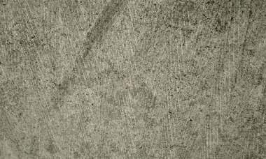 Parlak boya ve yıpranmış parçalarla eski beton duvar yüzeyinin soyut arkaplanı. Güzel Soyut Grunge Dekoratif Karanlık Stucco Duvarı Arkaplanı. Sanat pürüzlü Stylize Doku. Aşınmış bej renkli, çizik parmaklarla kaplanmış yıpranmış beton duvar.