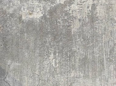 Soyut Taş Duvar arka plan, çimento efektli taşralı mermer dokusu, gri renk desenli doğal mermer figür, kum desenli. Geniş kaba beton duvar dokusu. Boş sert çimento yüzeyinin arka planı. Duvardaki çizikler çatlaklar..