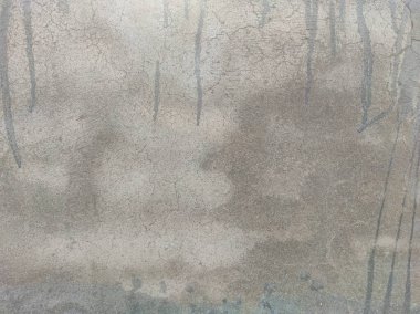 Soyut Taş Duvar arka plan, çimento efektli taşralı mermer dokusu, gri renk desenli doğal mermer figür, kum desenli. Geniş kaba beton duvar dokusu. Boş sert çimento yüzeyinin arka planı. Duvardaki çizikler çatlaklar..