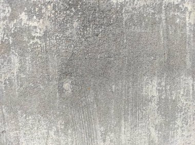 Soyut Taş Duvar arka plan, çimento efektli taşralı mermer dokusu, gri renk desenli doğal mermer figür, kum desenli. Geniş kaba beton duvar dokusu. Boş sert çimento yüzeyinin arka planı. Duvardaki çizikler çatlaklar..