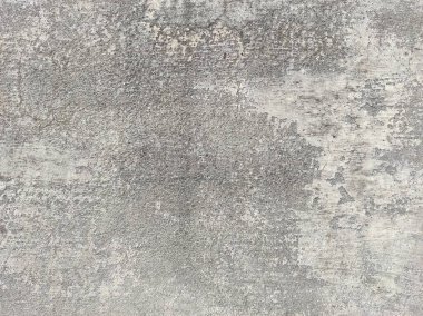 Soyut Taş Duvar arka plan, çimento efektli taşralı mermer dokusu, gri renk desenli doğal mermer figür, kum desenli. Geniş kaba beton duvar dokusu. Boş sert çimento yüzeyinin arka planı. Duvardaki çizikler çatlaklar..