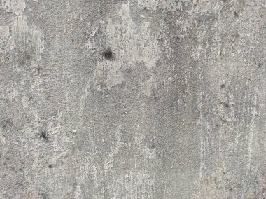 Soyut Taş Duvar arka plan, çimento efektli taşralı mermer dokusu, gri renk desenli doğal mermer figür, kum desenli. Geniş kaba beton duvar dokusu. Boş sert çimento yüzeyinin arka planı. Duvardaki çizikler çatlaklar..