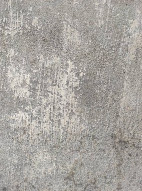 Eski Pürüzlü ve Kirli Stucco duvar arkaplanı ya da dokusu. Duvarla kaplanmış aşınmış beton duvar. Yüksek çözünürlüklü taş ve beton yüzeyler, çimento efektli arka plan mermer dokusu çizikler ve çatlaklar..