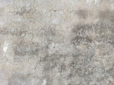 Eski Pürüzlü ve Kirli Stucco duvar arkaplanı ya da dokusu. Duvarla kaplanmış aşınmış beton duvar. Yüksek çözünürlüklü taş ve beton yüzeyler, çimento efektli arka plan mermer dokusu çizikler ve çatlaklar..