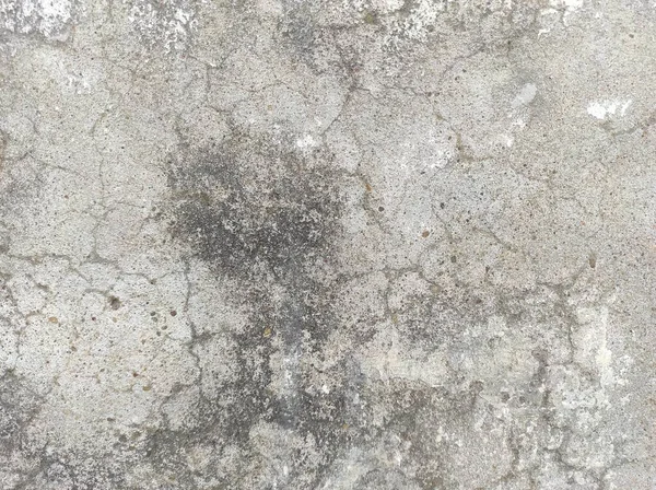 Old Rough And Dirty Stucco wall background or texture.Weathered concrete wall of Grey color covered with scratched Wall.High resolution stone and concrete surfaces,background Rustic marble texture background with cement effect scratches and cracks.
