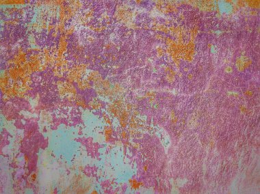 Çizik ve çatlaklarla paslı bir doku. 