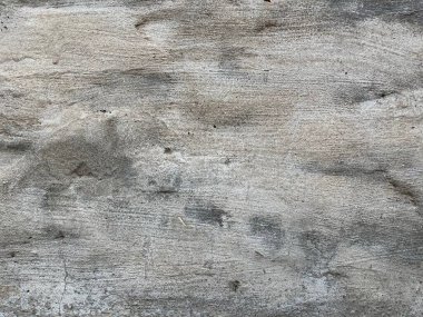 Çizik ve çatırtı olan duvar parçası. Eski, kirli, deri döken, deri döken, duvar kağıtları soyan arka plan. Arka plan için yüzey duvarı betonu deseni. Arka plan için eski beton duvarın soyulmuş dokusu betonu ortaya çıkardı..