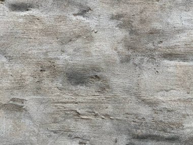 Çizik ve çatırtı olan duvar parçası. Eski, kirli, deri döken, deri döken, duvar kağıtları soyan arka plan. Arka plan için yüzey duvarı betonu deseni. Arka plan için eski beton duvarın soyulmuş dokusu betonu ortaya çıkardı..