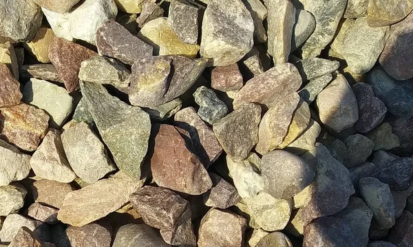 stock image Pebble stones great as a background.Close Capture on Stone Walk-way texture.Slate stone wall textured background.Gravel Texture.Terrazzo texture.Terrazzo flooring.Useful background of asphalt texture.River rock pebbles with shades of different gray.