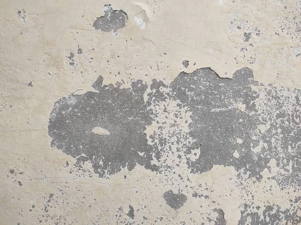 Eski, eskimiş beton duvar, köhne taş zemin, çatlak döşeme, hasarlı döşeme, eski deri döşeme boyası, eski çatlak boyayla kaplı duvar..