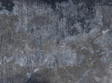 Eski, sıkıntılı, kirli ve pürüzlü arka plan tasarımı soluk grunge dokusuyla. Parşömen dokusu. Parşömen arkaplanı için cesur, çiçek desenli, aşınmış bir doku..