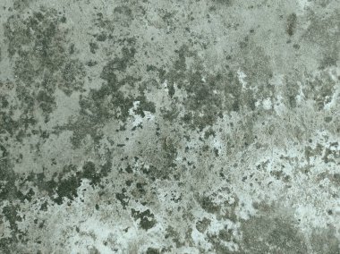 Siyah ve beyaz arka plan pankartıyla eski grunge dokusu, kirli sıkıntılı karanlık kirli kenarlar ve nötr tek renkli arkaplan tasarımında açık gri merkez. Yakın plan boyanmış taş duvar. Detaylı, gri beton arka plan dokusu..