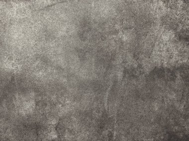 Arka plan gri duvar dokusu soyut grunge harap olmuş. Çiğ beton duvar dokusu. Gri sıva duvar dokusu arka plan. Desen arkaplan veya doku seramik döşemesi olarak kullanışlıdır. Parşömen veya belge arkaplanı için cesur, çiçek desenli, aşınmış bir doku
