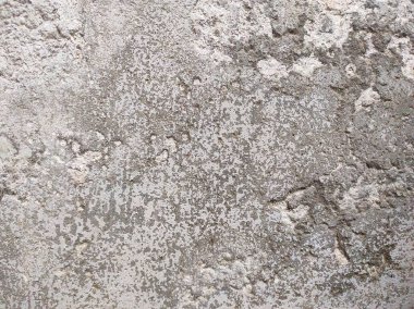 Eski, sıkıntılı, kirli ve pürüzlü arka plan tasarımı soluk grunge dokusuyla. Parşömen dokusu. Parşömen arkaplanı için cesur, çiçek desenli, aşınmış bir doku..